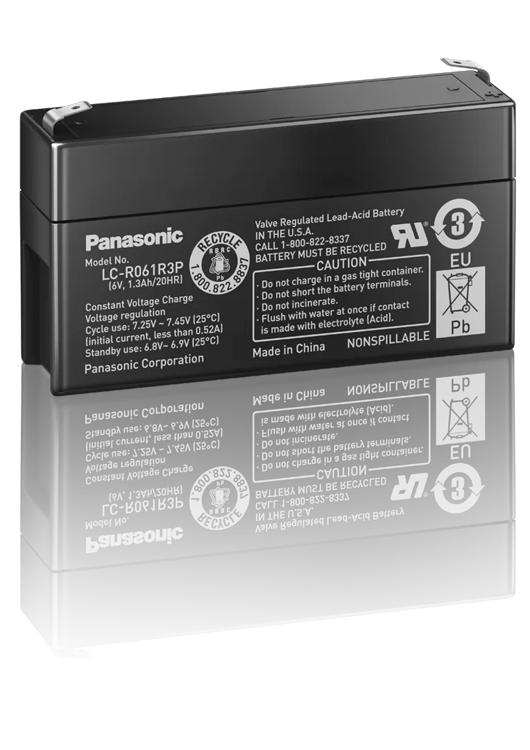 Panasonic battery on a reflective surface.